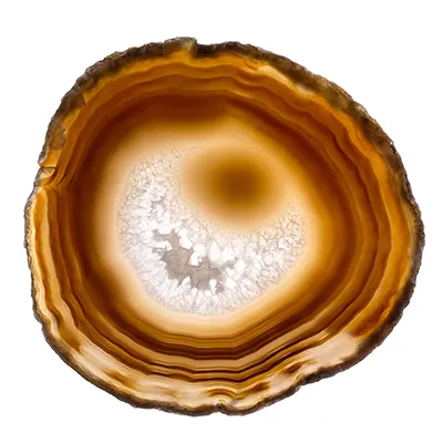 A close-up of a brown agate slice with visible banding and a crystalline center, showcasing Koket's Natural Agate finish.