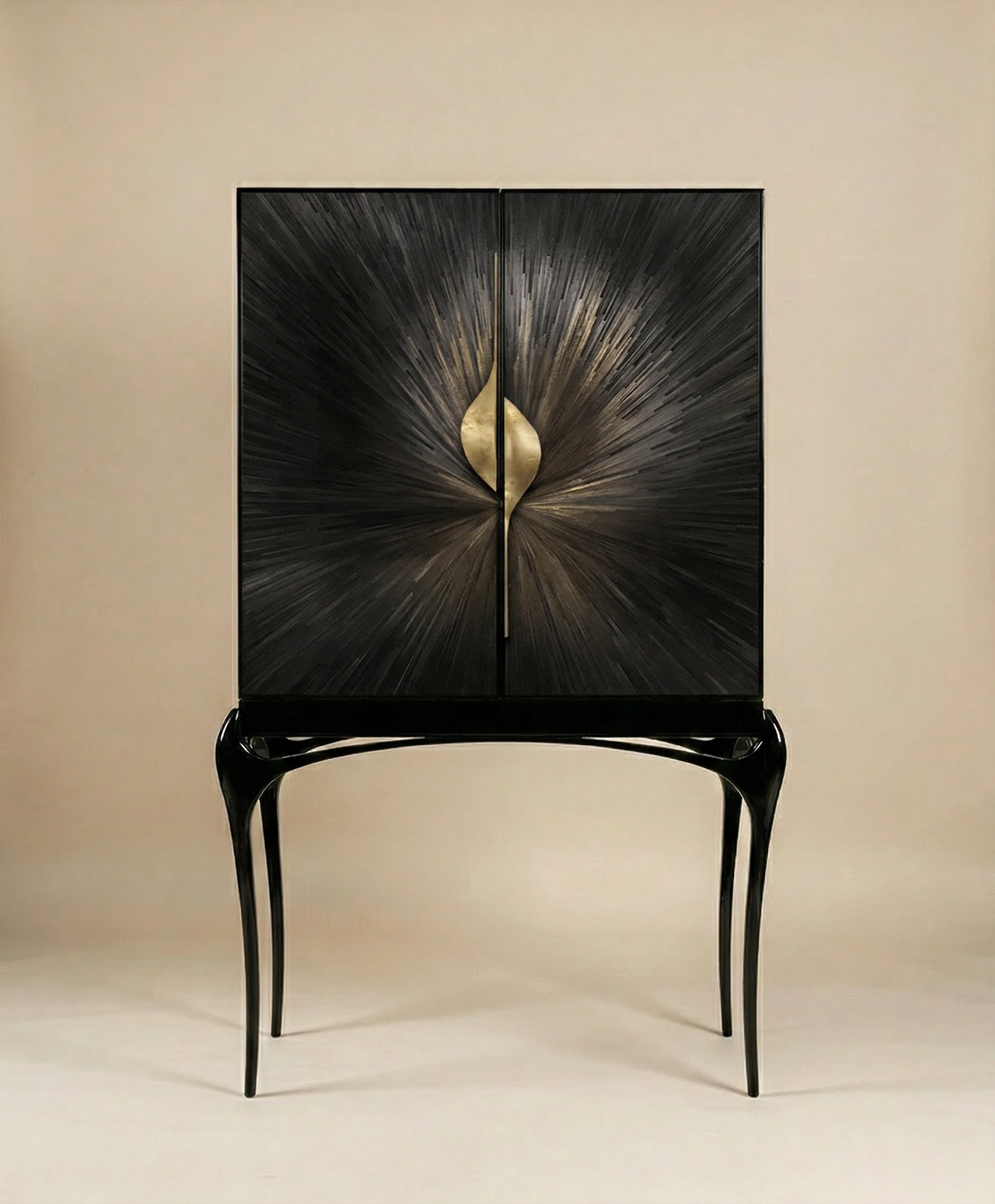 Celine Straw Bar Cabinet with dark textured radial doors and a central gold leaf-shaped handle
