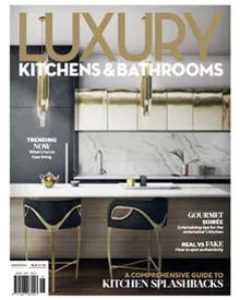 Press clipping of the Luxury Kitchens & Bathrooms magazine cover featuring a modern kitchen with bar stools.