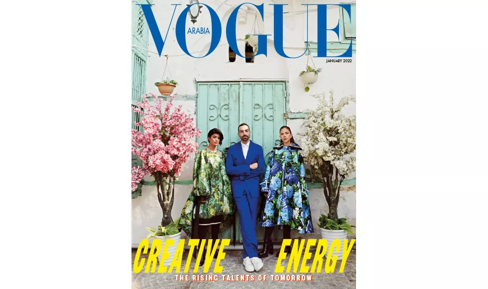 Vogue Arabia cover featuring Creative Energy: The Rising Talents of Tomorrow with three people in front of a turquoise door.
