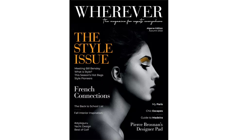 Press clipping of Wherever Magazine cover, featuring a stylized black and white portrait with yellow eye makeup.