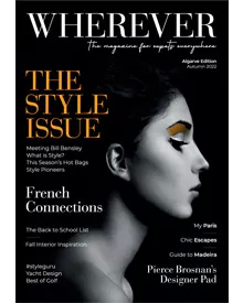 Press clipping of Wherever Magazine cover, featuring a stylized black and white portrait with yellow eye makeup.