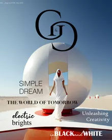 G&G magazine cover, May 2023, featuring a woman in a white dress standing in front of a futuristic white structure.