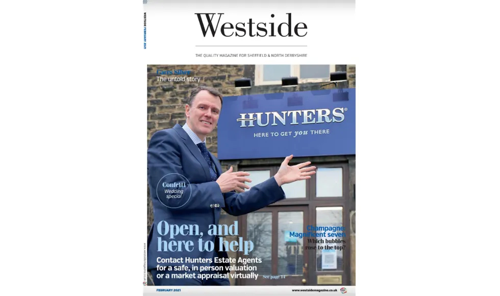 Westside press clipping cover featuring a man in a suit gesturing towards a "Hunters" building.