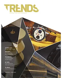 Trends press clipping cover with a watch, architectural elements, and abstract shapes in gold and black.
