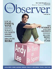 Sydney Observer press clipping cover featuring Andy Lee seated on a pink cube, smiling at the camera.