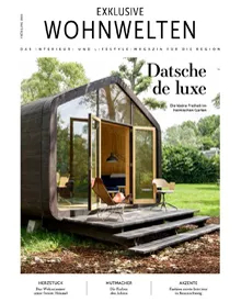 Exklusive Wohnwelten press clipping cover, featuring a modern, small wooden house with large glass doors.