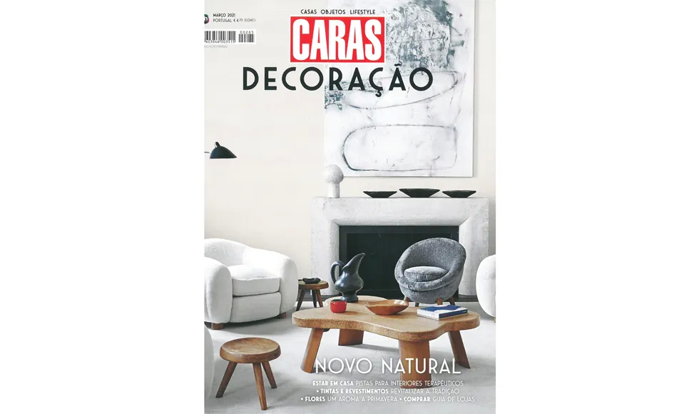 Caras Decoração press clipping, the cover featuring a modern living room with neutral tones and wooden furniture.