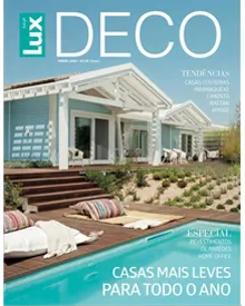 Lux Deco magazine cover showing a modern house with a pool and outdoor lounging area.