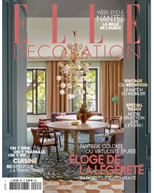 Press clipping: Elle Decoration magazine cover featuring a dining room with a large, modern chandelier.