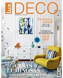 Lux Deco magazine cover featuring a bright living room with a yellow armchair and blue abstract art, emphasizing luminous homes.