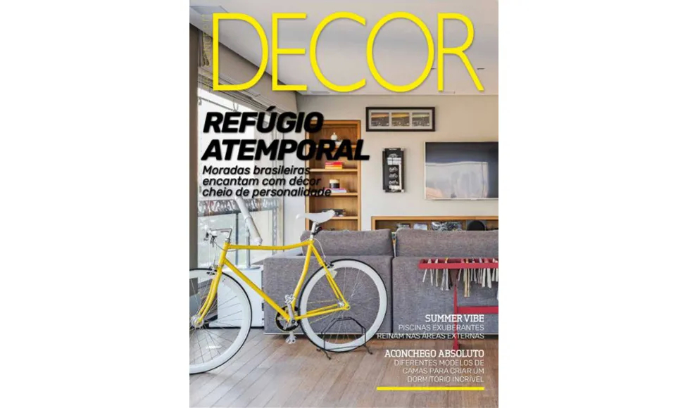 Press clipping: Revista Decor magazine cover, showing a living room with a yellow bicycle.