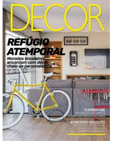 Press clipping: Revista Decor magazine cover, showing a living room with a yellow bicycle.