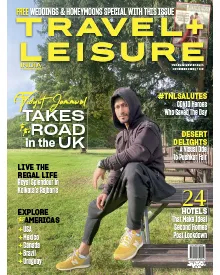 Press clipping: Travel + Leisure India magazine cover, featuring a man sitting in a park.