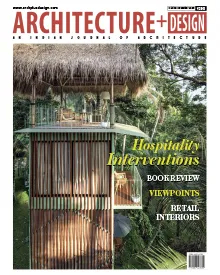 Architecture + Design magazine cover with a multi-story treehouse surrounded by lush greenery.