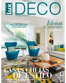 Lux Deco magazine cover with blue armchairs, a modern living room, and text like "Tendências" and "Ideias de presentes."