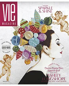 VIE Magazine cover with a woman's profile adorned with colorful Christmas ornaments, holiday sparkle & shine theme.