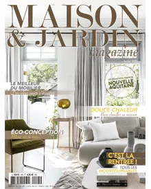 Maison & Jardin Magazine cover featuring a bright, airy living room with a sofa and green armchair.
