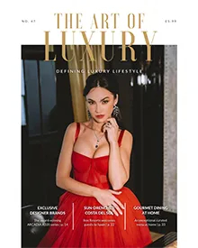 The Art Of Luxury press clipping, the cover, featuring a woman in a red gown and necklace.