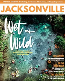 Jacksonville Magazine cover with an aerial view of people swimming in a clear, blue-green river.