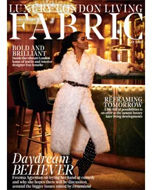 Fabric magazine cover, May 2023, featuring Freema Agyeman in a white fluffy coat, standing in a bar setting.