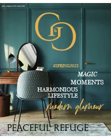 G&G press clipping, the cover, featuring a teal room with a desk, chair, and mirror.