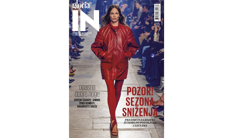 Cover of Gloria IN magazine, January 2024, featuring a model in a red jacket walking on a runway.