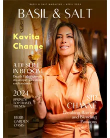 Cover of Basil & Salt Magazine, April 2024, featuring Kavita Channe in a winery with wine barrels.