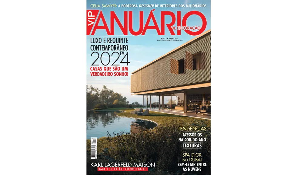 Cover of VIP Anuário Portugal magazine, featuring a modern house by a lake and headlines about luxury decor in 2024.