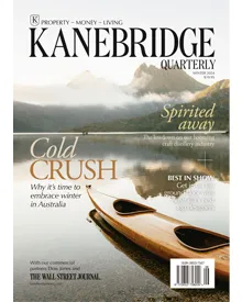 Kanebridge News Quarterly cover, featuring a canoe on a lake with mountains in the background. The text Cold Crush is prominent.