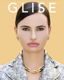 Glise Magazine cover showing a model with striking eyes and prominent cheekbones, featuring bold white text GLISE across the image.