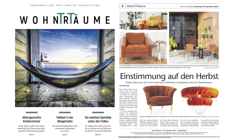 Wohnträume magazine with a hammock bathtub cover and a home decor spread featuring an orange Besame Chair.