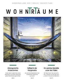 Wohnträume magazine cover with a hammock bathtub overlooking a sunset, featuring articles on age-appropriate children's rooms.