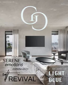 Cover of G&G magazine, March 2023, showcasing a luxurious living room interior with a sofa and decorative lighting.