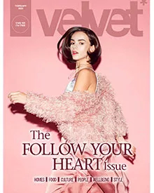 Press clipping of Velvet Magazine cover with a woman in a pink fluffy coat, "Follow Your Heart Issue".