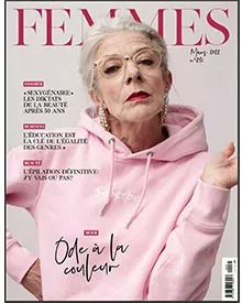 Magazine cover of Femmes featuring an older woman with glasses and a pink hoodie, with French text headlines.