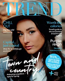 Magazine cover of Trend featuring a woman with dark hair and a hat, with headlines like Town and Country.