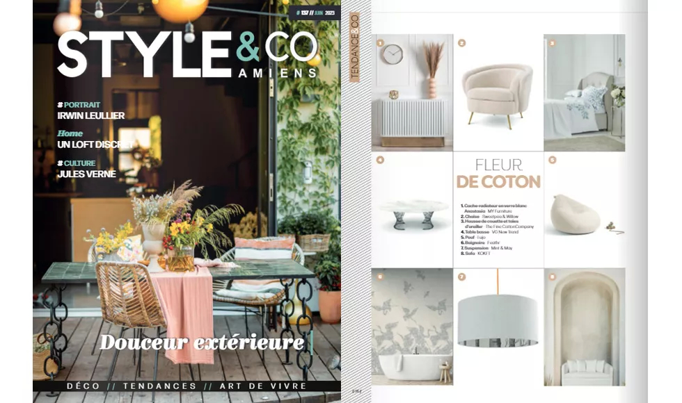 Style & CO press clipping featuring Koket products, including a cream-colored chair and a table with a marble top.