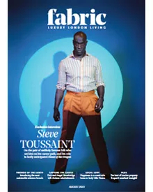 Cover of Fabric Magazine featuring Steve Toussaint posing against a blue spotlight, with Luxury London Living text.