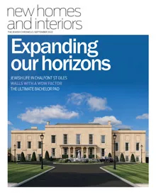 Cover of New Homes and Interiors magazine featuring a grand, classical manor house.