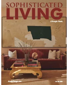 Sophisticated Living magazine cover featuring a living room with a red velvet sofa, a light wood coffee table, and abstract art.