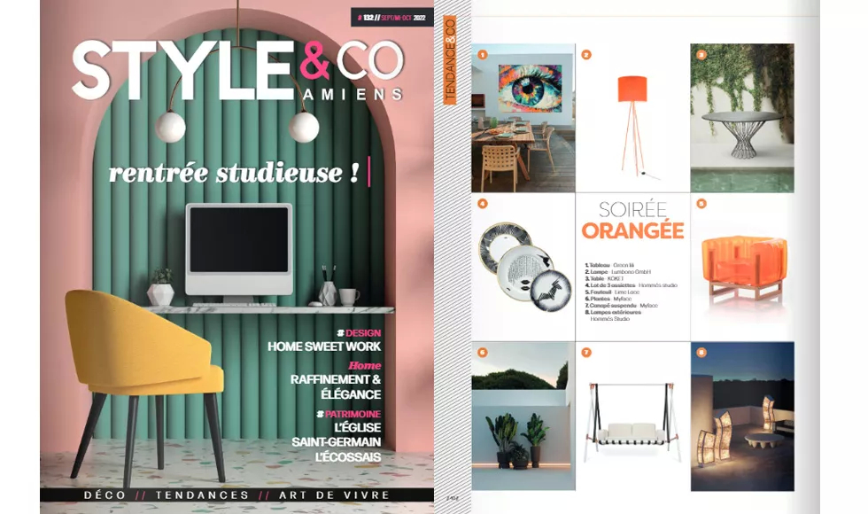 Press clipping of Style & CO magazine, showing its cover and an interior page with orange-themed decor and furniture.