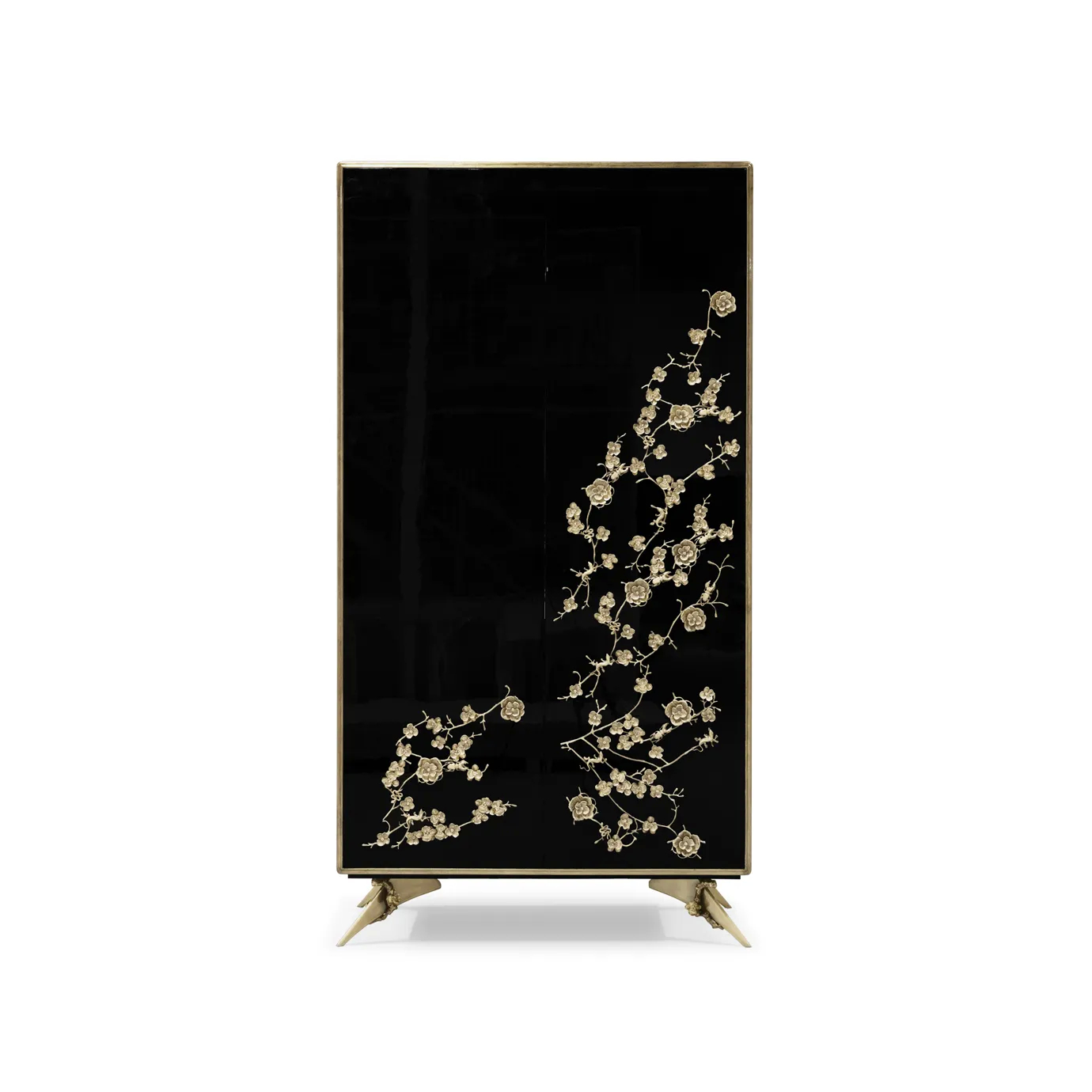 The Spellbound Lacquer Armoire features a black structure adorned with elegant golden flower-shaped details along the bottom of the front doors.