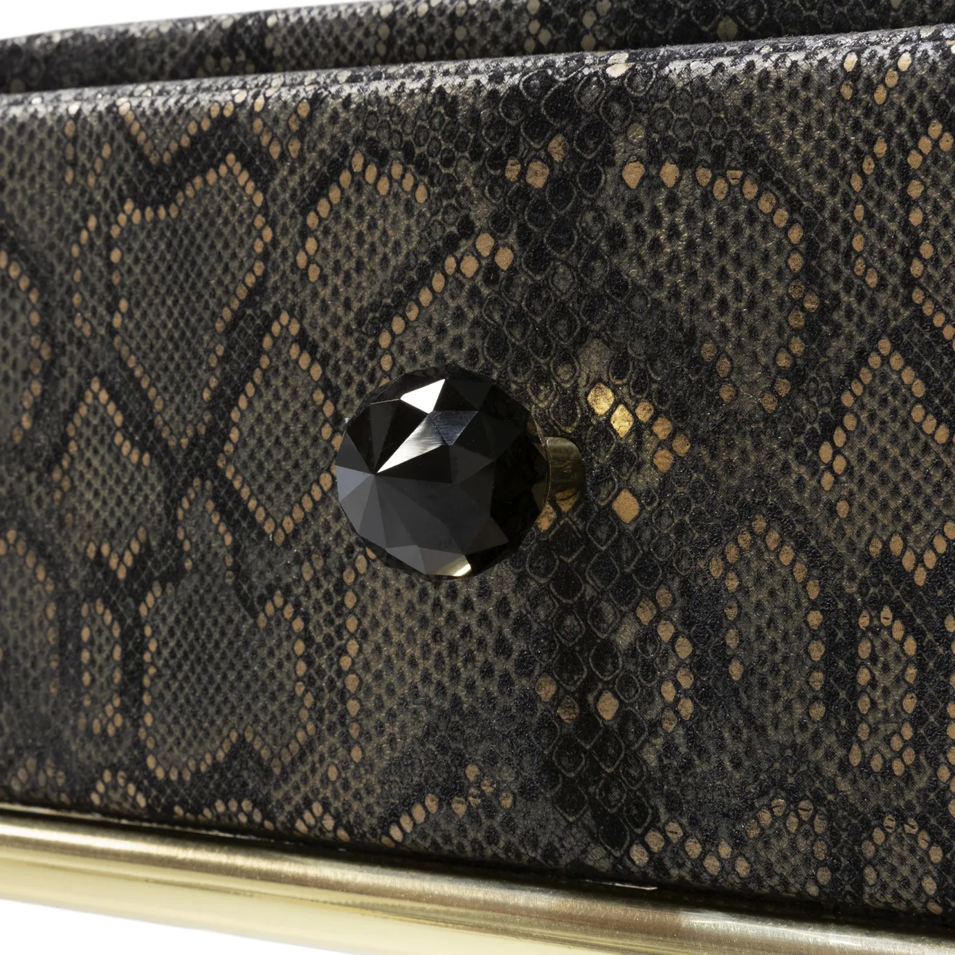 Elegant close-up of the black crystal knob of the textured Burlesque Console.