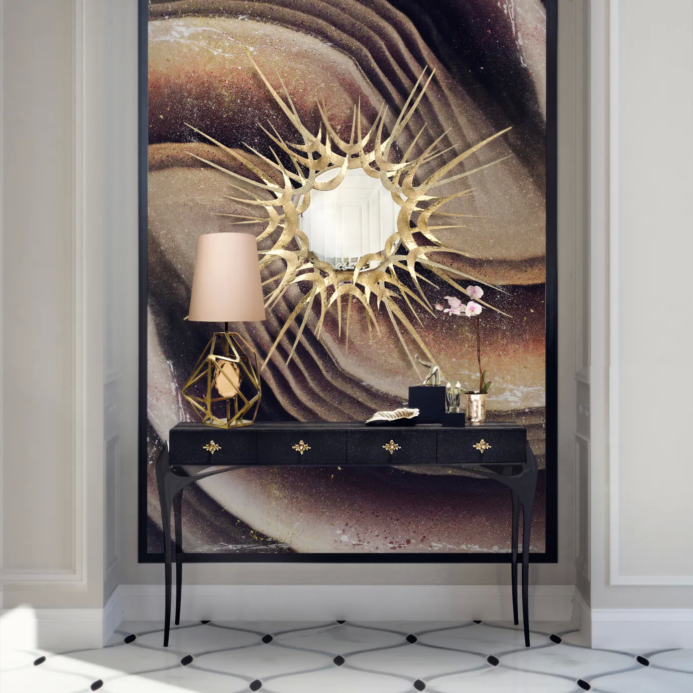 Elegant entryway with the black Temptation Console adorned with golden star-shaped handles, topped with a table lamp featuring a golden geometric base and a beige lampshade, and several black and gold decorative objects, beneath a dramatic Guilt Mirror with a golden sunburst frame, against a wall with an abstract artistic panel in shades of brown, gold, and black, on a black and white marble floor with a geometric pattern.