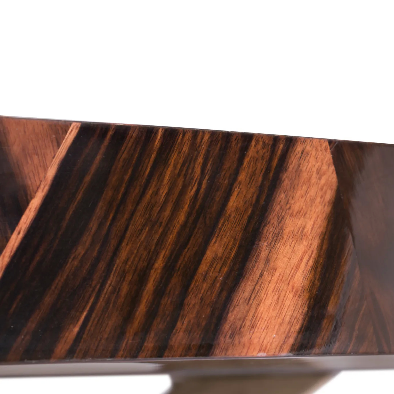 Patch Dining Table with geometric wood veneer top and sculptural oak base, finished in high gloss.
