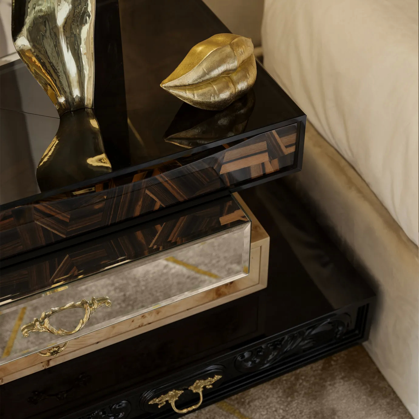 Modern dark wood nightstand positioned next to a bed in a sleek bedroom interior, highlighting minimalist design and refined geometric detailing