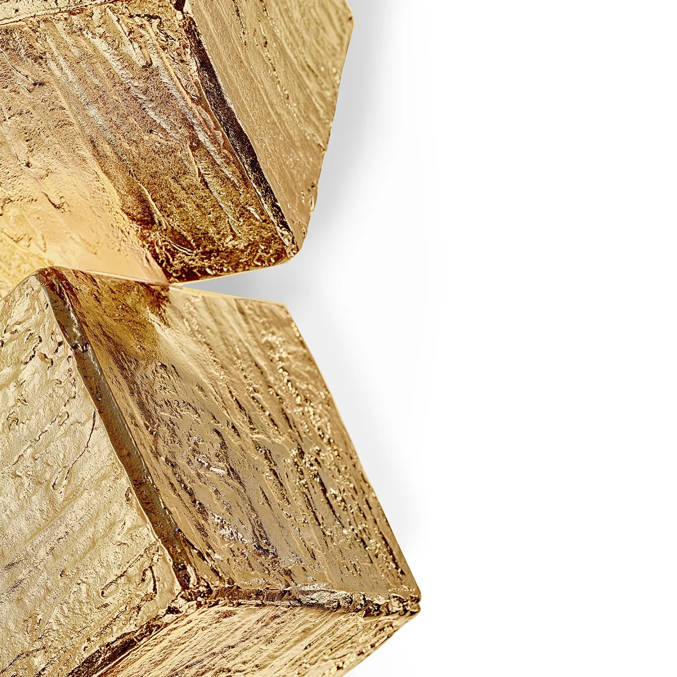 Close-up detail of the Cubic Big Sconce, showcasing its angular geometric form and refined metallic texture for bold, contemporary lighting aesthetics