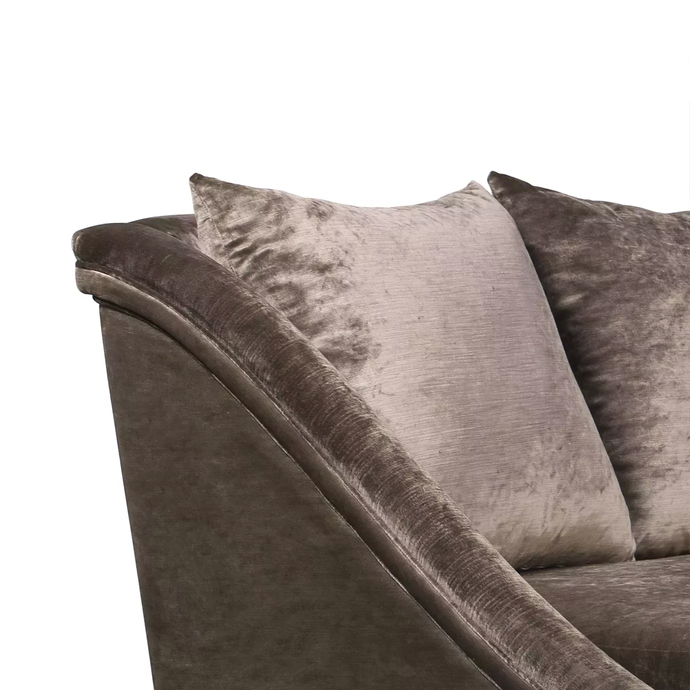 Elegant close-up of the armrest and the brown velvet cushions of the Geisha Curve Sofa.