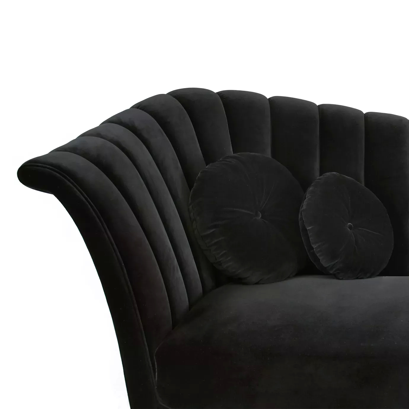 Elegant close-up of the black velvet upholstery and the matching round cushions of the Caprichosa Fully Upholstered Sofa.